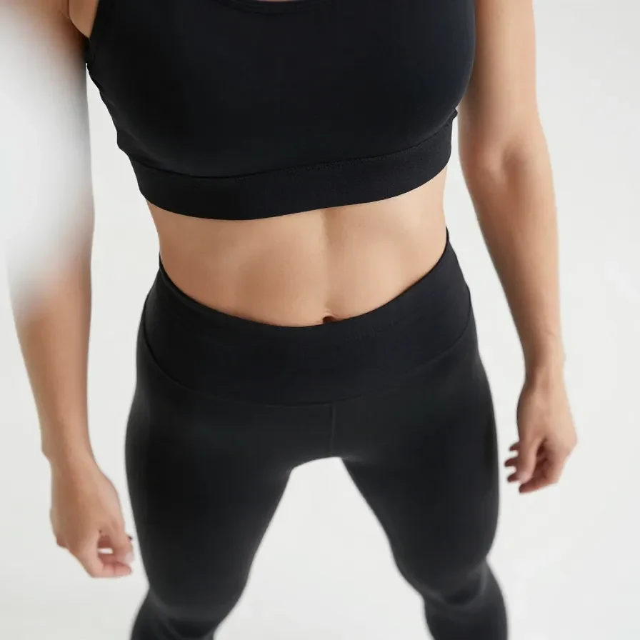 Close-up view of Micro Legacy Legging in Onyx Black, showcasing the fabric texture and design